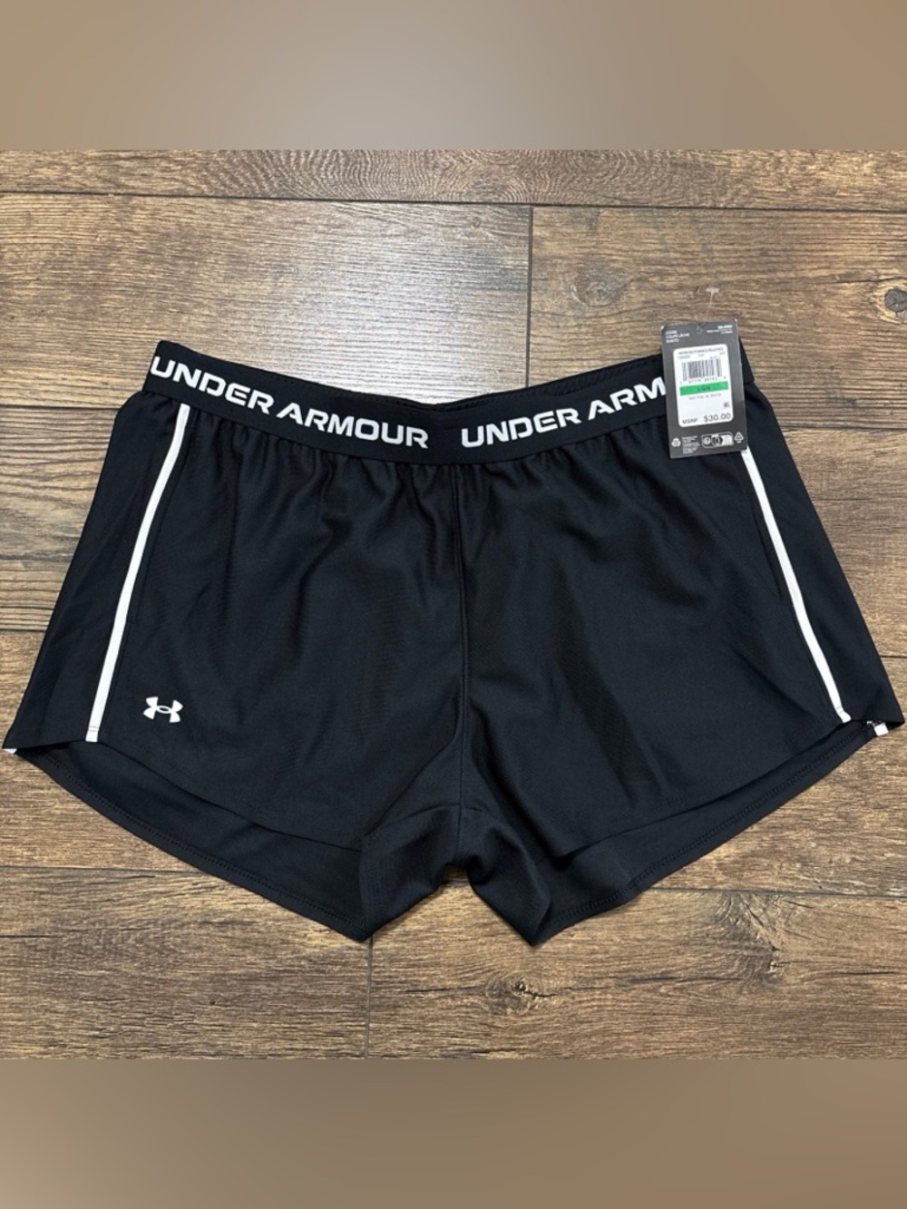 Under Armour Women's Black Athletic Shorts with White Piping and Pockets Size L